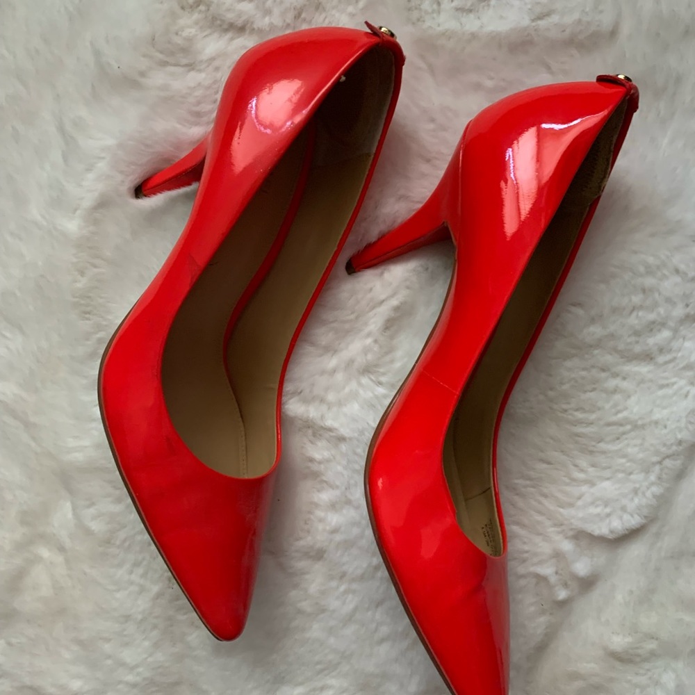 Michael Michael Kors Candy Red patent leather pumps.
